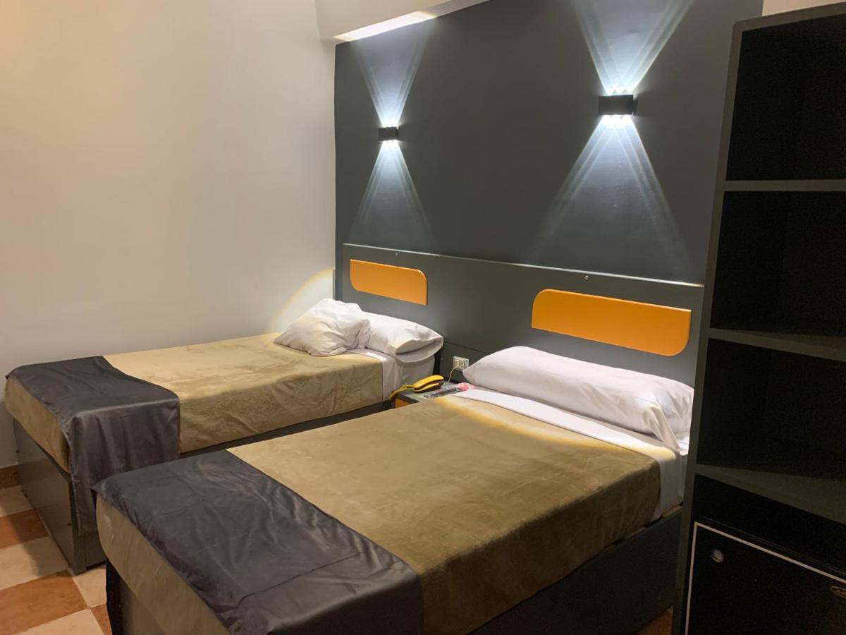 Royal Hotel Qinā Екстериор снимка