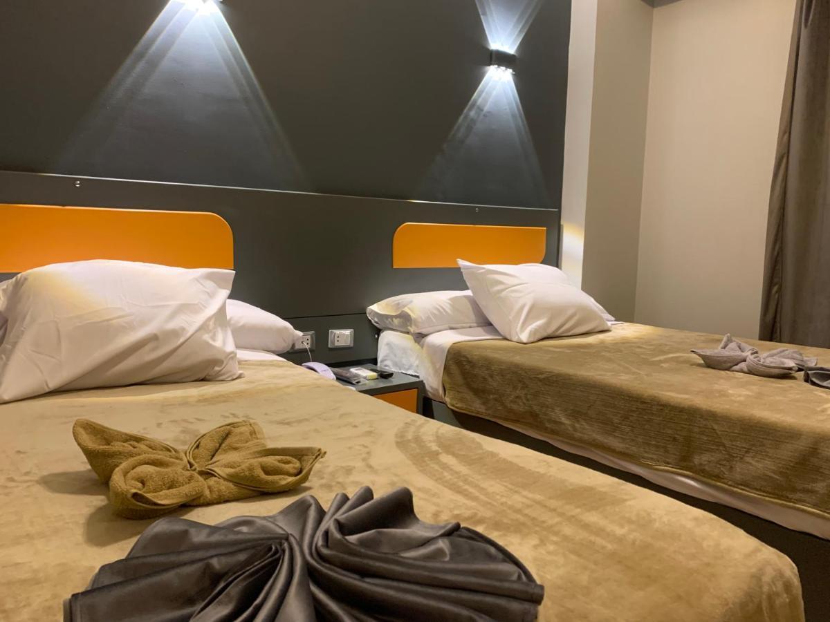 Royal Hotel Qinā Екстериор снимка