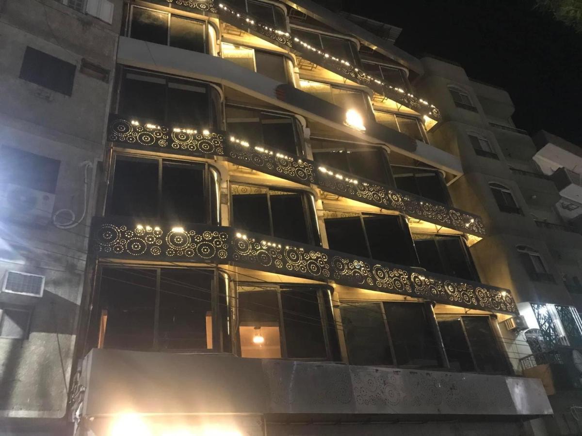 Royal Hotel Qinā Екстериор снимка