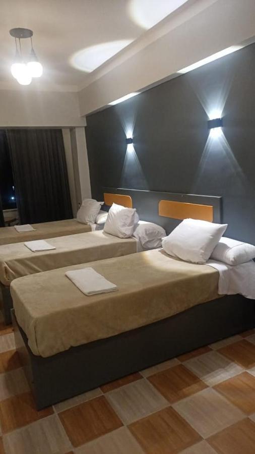 Royal Hotel Qinā Екстериор снимка